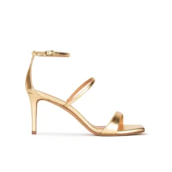 Daquesha Sandalias doradas de piel con tacón medio y pulsera