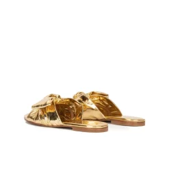 Quetty Sandalias planas doradas con detalle de lazo